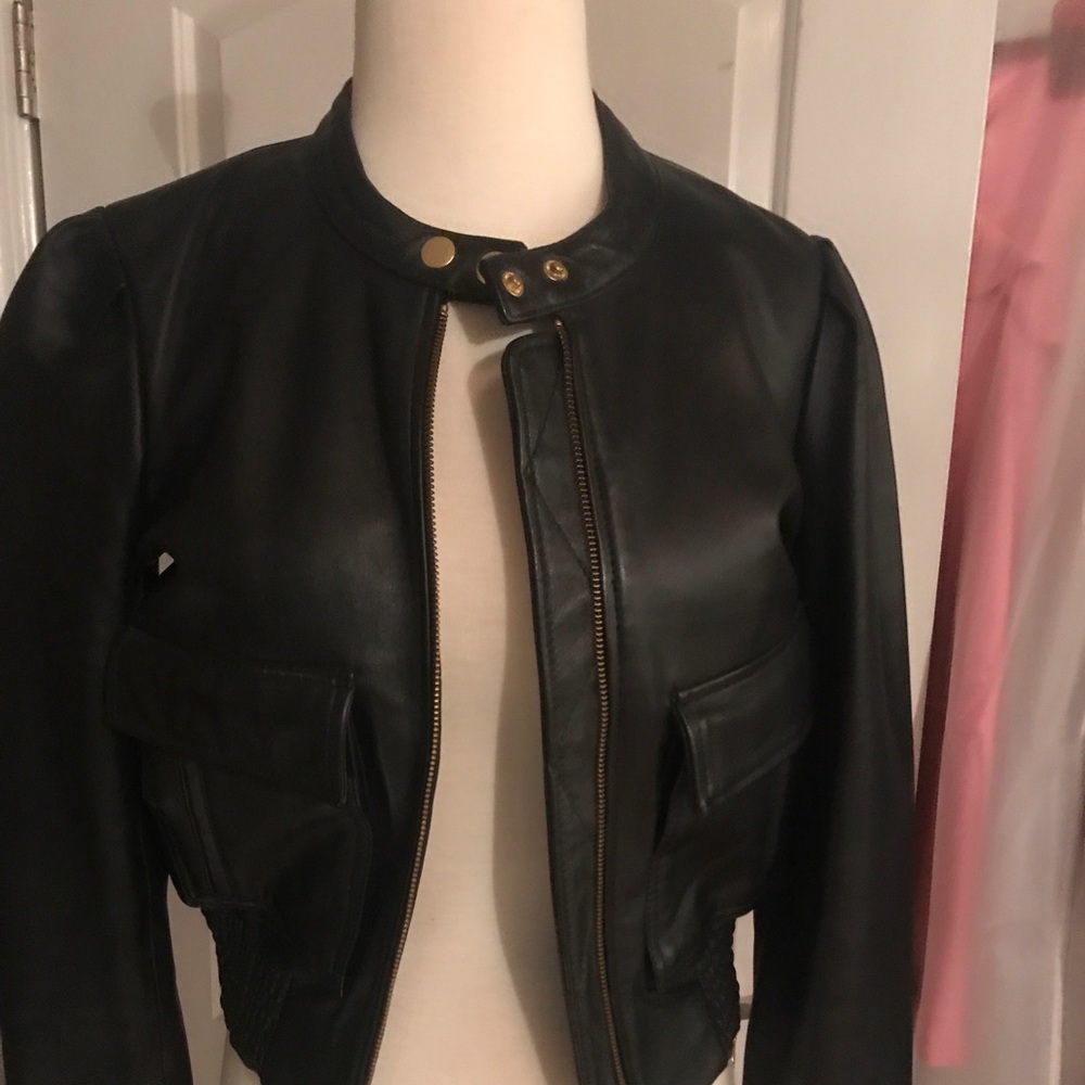 Black genuine leather Moto jacket. Small,supercute